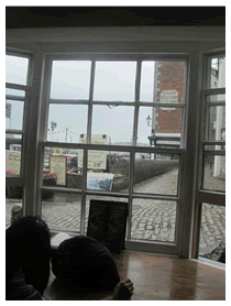 Inside Mayflower House looking out into the street